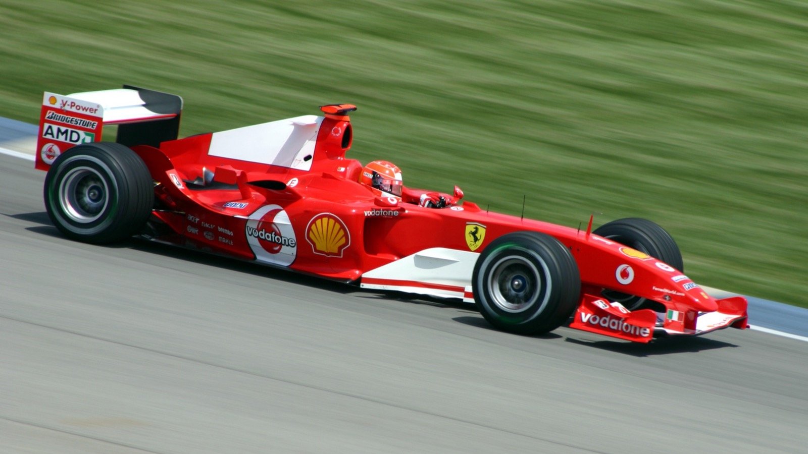 Michael Schumacher kilpaili Ferrarilla — kuvituskuva.